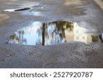 a puddle on the road