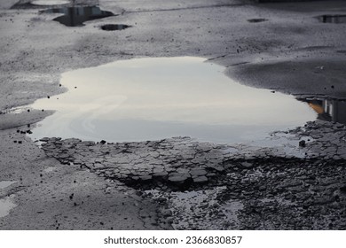 puddle on the road after the rain