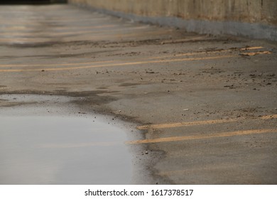 Puddle in a parking lot