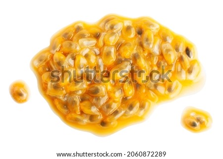 Puddle of passionfruit pulp with drops isolated on white background.
