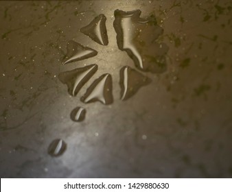 Puddles On Formica Counter Top