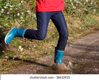 311 Adult Jumping In Puddle Stock Photos, Images & Photography ...