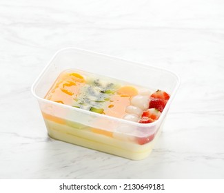 Puding Buah, Chilled Cold Jelly Pudding With Fresh Fruit, Lychee. Strawberry, Orange,  And Mixed Cocktail Fruit On Top In Plastic Transparent Bento Box Dessert Menu