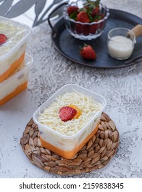 Puding Salad Buah Or Mango Pudding With Fruit Salad On Top, Sprinkled With Cheese And Strawberries And Mandarin Oranges