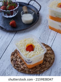 Puding Salad Buah Or Mango Pudding With Fruit Salad On Top, Sprinkled With Cheese And Strawberries And Mandarin Oranges