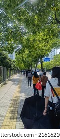 Pudong, Shanghai, China - May 20 2022: People Lining Up In Front A Super Market To Get Grocery After Shanghai's Partial Easing Of Lock Down In May.