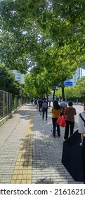 Pudong, Shanghai, China - May 20 2022: People Lining Up In Front A Super Market To Get Grocery After Shanghai's Partial Easing Of Lock Down In May.