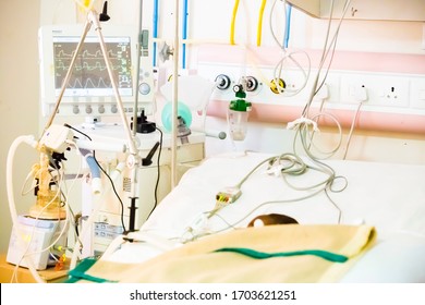 PUDUCHERRY, INDIA - MARCH Circa, 2020. Baby On Big Bed Placed On An Artificial Lung Ventilation Equipment In Indian Hospital. Pneumonia Diagnosting. COVID-19 And Coronavirus Identification