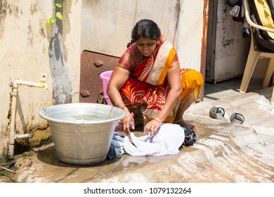 2,149 Indian Woman Washing Clothes Images, Stock Photos & Vectors ...