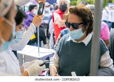 Puebla, Mexico - August 11, 2021: Grandparents Public Health Day, Lining Up To Receive Consultation