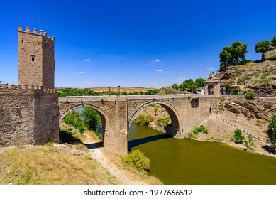 Puente De Alcántara, A Roman Arch Bridge Across The Tagus River In Toledo, Spain