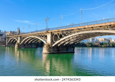 Puente de Triana in Seville Spain. Iron arch bridge connecting the Triana neighborhood to Seville center


 - Powered by Shutterstock