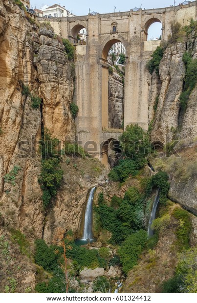 The Puente Nuevo (New Bridge) is largest\
bridges that span the 120-metre deep chasm that divides the city of\
Ronda, Spain. In was build in\
1793