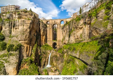 The Puente Nuevo ("New Bridge") span the 120-metre-deep chasm that carries the GuadalevaÂ­n River and divides the city of Ronda, the El Tajo gorge. Ronda, Provence of Malaga, Andalusia, South of Spain.