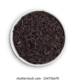 Puerh Tea Leaves In A White Bowl.