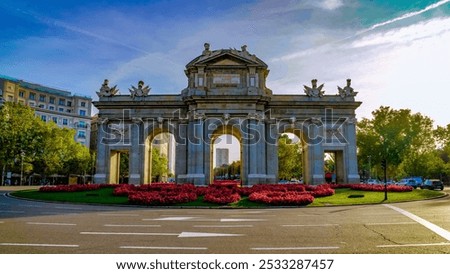 The Puerta de Alcalá is one of the five ancient royal gates that gave access to the city of Madrid, Spain.