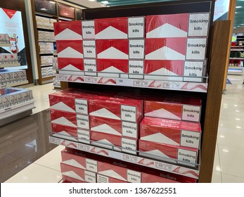 Puerta Vallerta, Mexico - April 11, 2019. A Duty Free Store Inside The Puerto Vallerta Airport Selling Boxes Of Cigarettes With Labels Reading 