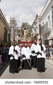 PUERTO REAL, CADIZ - APRIL 24: altar servers belonging to the brotherhood of the greatest Inglesia resusitaste accompany Christ's resurrection on Sunday. April 24, 2011 in Puerto Real, Cadiz (Spain)