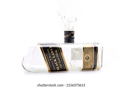 Puerto Real, Spain - May 14, 2022: Broken Johnnie Walker Black Label Whiskey Bottle