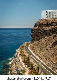 Puerto Rico, Gran Canaria - June 19 2018: The View Of The Walkway To Amadores Beach From The Top Of The Mountain In Puerto Rico 