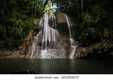 A Puerto Rico Waterfall In The Rainforest