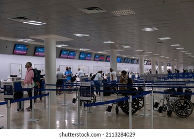 Puerto Vallarta Mexico Dec 3 2021: Half Empty Check In Desks At The Airport. Empty Airport, Severe Weather, Advisory, Alert, Flight Cancellation, Airport Shut Down Concept.