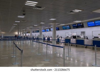 Puerto Vallarta Mexico Dec 3 2021: Line Of Empty Check In Desks At The Airport. Empty Airport, Severe Weather, Advisory, Alert, Flight Cancellation, Airport Shut Down Concept.