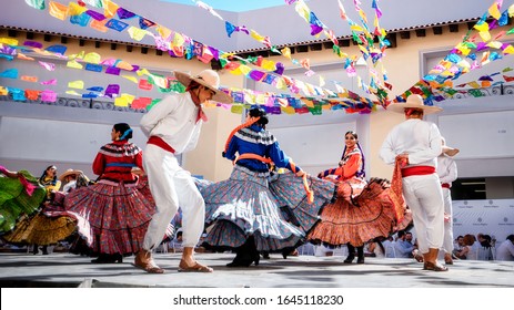 Puerto Vallarta, Mexico - June 28th 2020 - Photo Of People Dancing Folklore In Traditional Mexican Dress. Girls And Boys Dance Folk In Beautiful Clothes. Mexico Culture, Fashion And Tradition