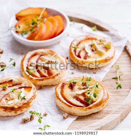 Puff pastry tarts with nectarines, camembert and thyme