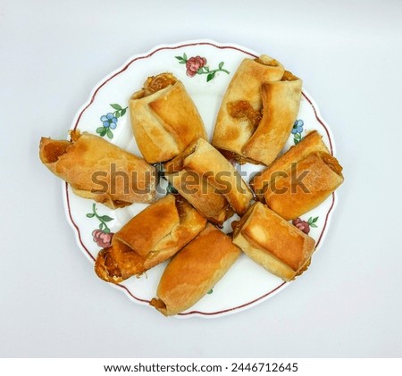 Puff pastry rolls with jam filling