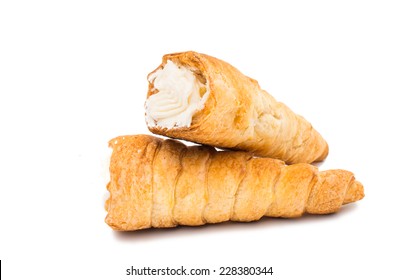 puff rolls with cream on white background