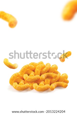 puffed cheese corn chips in isolated on white background
blank space