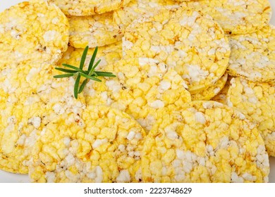 Puffed Corn Cake Texture Background. Corn Diet Bread With Fragrant Herbs And Spices, Waffle With Corns, Rice, Cereal Snack, Yellow Crackers, Diet Galettes On White Background