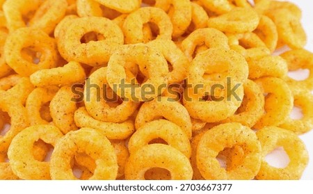 Puffed corn ring chips with salt and oregano. 
