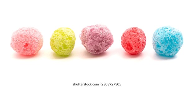 Puffed Freeze Dried Fruit Flavored Candy Isolated on a White Background - Shutterstock ID 2303927305