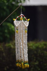 Puffed Rice Or Popped Rice Made From Grain,Pop Rice Paddy Seed Roasted Through The Heat To Be Cooked,The Tradition Of Steering Wheel Popped Rice:Garlands Made Of Popped Marchers  To Worship The Fait.