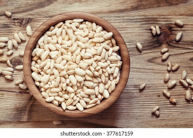 Puffed Sweet Rice In A Round Bowl On The Old Wooden Background, Top View