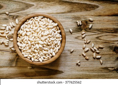 Puffed Sweet Rice In A Round Bowl On The Old Wooden Background, Top View