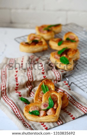 Similar – Puff pastry tarts with nectarines, camembert and thyme