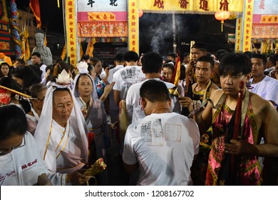 Pukhet Vegetarian Festival 9-17 October 2018 (THAILAND)-Sacred Rituals Are Performed At Various Chinese Shrines And Temples. They Include Some Feats Such As Walking Barefoot On Hot Coals 