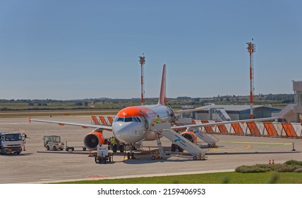 PULA, CROATIA - September 13 2019: Airbus A319 on the runway loads luggage and passengers before take-off