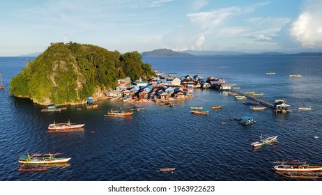 Pulau Kosong, Jayapura city, Papua, Indonesia: the beauty of an empty island when viewed from the west side filled with boats, with the majority of the population working as fishermen (26 Apr 2021)
