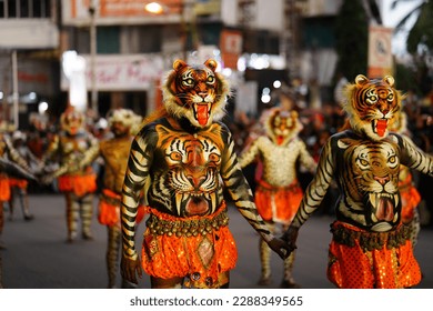 Pulikali recreational folk art Onam tiger dance - Shutterstock ID 2288349565