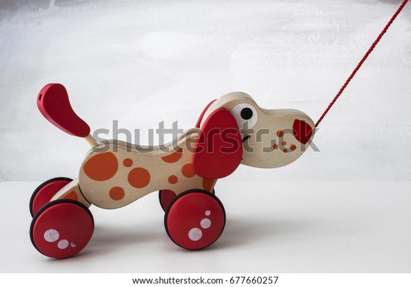 wooden pull along dog