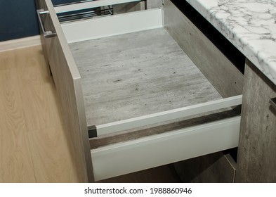 Pull Open Drawer In Cabinet. Modern Kitchen Concept.