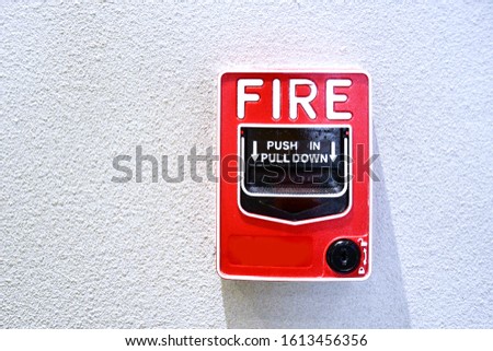 Pull station or call point, Manual fire alarm activation, Activated Notifier pull station,  Modern fire alarm pull stations, Single action to pull down the handle to sound.