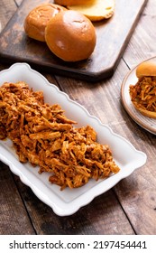 Pulled Bbq Chicken On A Serving Plate With Brioche Buns Ready To Making Sandwiches