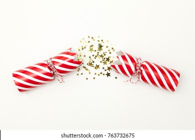 Pulled Christmas Cracker On A White Background Crackers