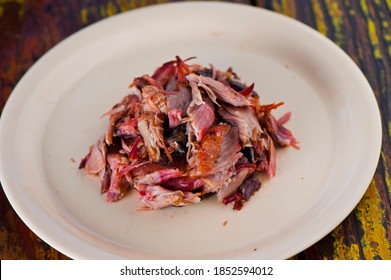 Pulled Pork. Barbecue Pulled Pork Being Chopped By A Butcher. Pork Served With Classic Bbq Sides Mac N Cheese, Cornbread, Coleslaw & Beer. Classic Traditional Texas Meats & Side Dishes.