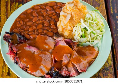 Pulled Pork. Barbecue Pork Platter Served With Classic Bbq Sides Mac N Cheese, Cornbread, Brussels Sprouts, Coleslaw & Beer. Classic Traditional Texas Meats & Side Dishes.